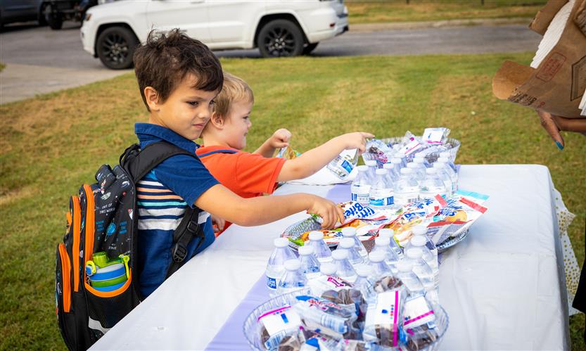 Students enjoy pastries with their parents